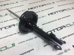 амортизатор перед лев Старекс Гранд - фото 1